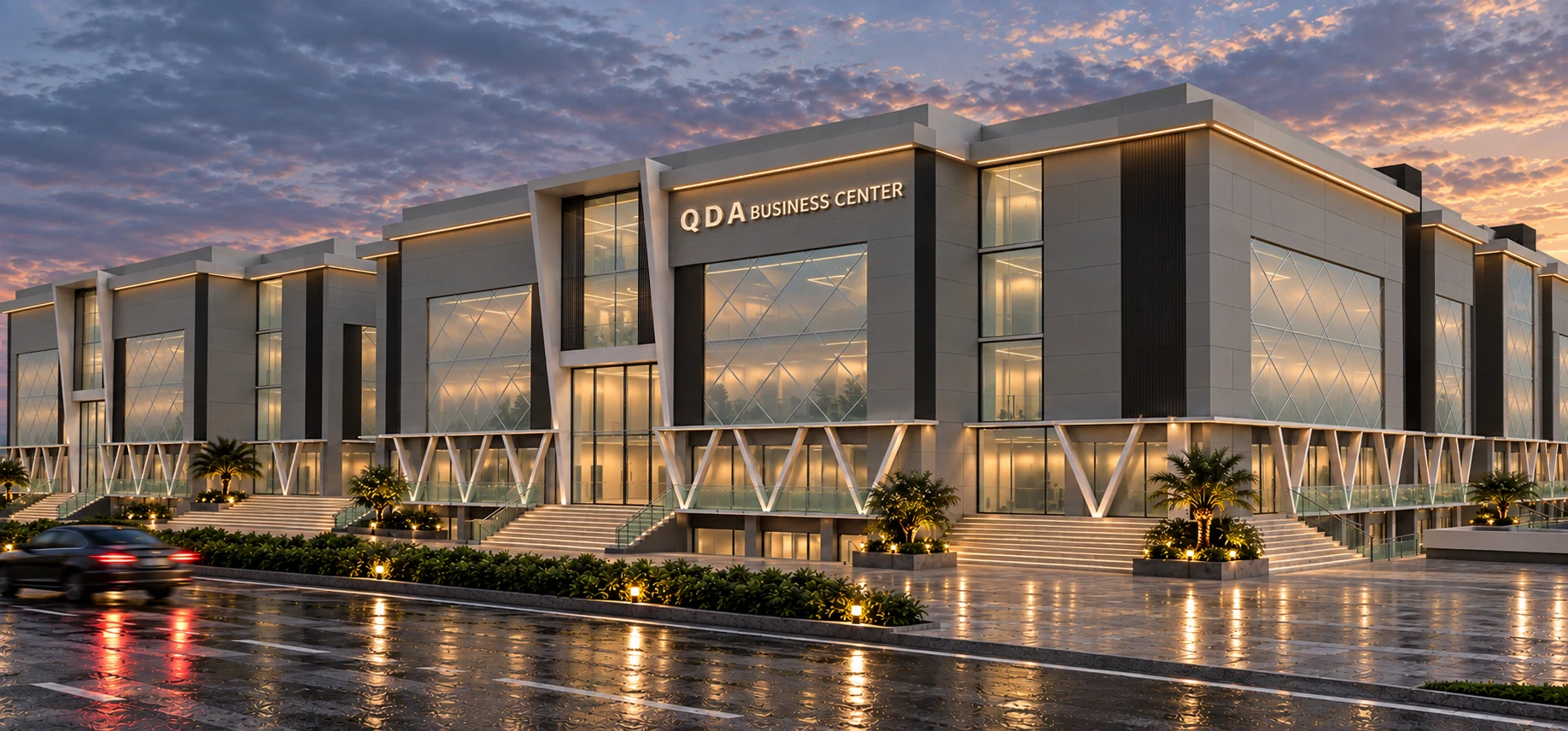 QDA Business Center — corner elevation at dusk